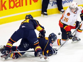 The Belleville Bulls (white jerseys) fell 5-1 to the Barrie Colts at Yardmen Arena in Belleville, Ont. Saturday evening, Dec. 7, 2013. - JEROME LESSARD/The Intelligencer