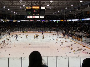 Stuffed animals rained down onto the ice after Patrick White scored the Sting's first goal in their Teddy Bear Toss game against the Guelph Storm on Sunday, Dec. 8. 3030 stuffed animals were collected at the game, brining the total for the fundraiser to over 45,000 in the last 16 years.  (Teddy Bear Toss Game), Dec. 8, 2013. SHAUN BISSON/ THE OBSERVER/ QMI AGENCY