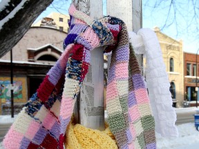 Free winter scarves hang from trees in Old Market Square in Winnipeg, Man. Sunday December 08, 2013.Brian Donogh/Winnipeg Sun/QMI Agency