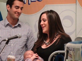 Jordana and David Walters of Kanata were at CHEO with their eight-week-old son, Leo, on Monday, Dec. 9, 2013 for a funding announcement. The province is giving the children's hospital $3.1 million over two years to safely transport fragile newborns in the region to intensive care. KELLY ROCHE/OTTAWA SUN/QMI AGENCY