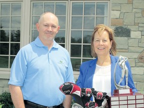 Photo supplied
In June, Londoner sports columnist Jeffrey Reed awarded Sunningdale G&CC director of golf Patty Howard the 2013 LondonOntarioGolf.com Heart Award. The award recognizes those who give back to the game of golf.