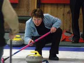 Deb Richardson looks over the house during the Susan Spiel held at Sydenham Community Curling Club on Dec. 7. Students at D.A. Gordon school are the big winners as the bonspiel raised money for the Susan Talach Memorial Book Fund. The fund has raised nearly $40,000 since its inception after Susan's death in the fall of 2006. Monies raised are used to purchase books and learning materials for the school. The bonspiel attracted 16 teams from across southwestern Ontario.