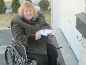 It took two years for Diane Munroe to get mail delivered to the mailbox on her west-end home. Now she's concerned that her mail will go to a community box that is not accessible for her, following cuts announced Wednesday by Canada Post.
Jessica Salmon/For The Whig-Standard