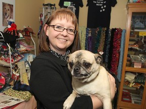 Sandra Scouten, operations manager at the Kingston Humane Society, holds Peggy, one of the animals up for adoption during a special promotion this month at the shelter.
Michael Lea The Whig-Standard