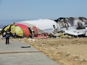 U.S. National Transportation Safety Board (NTSB) photo shows the wreckage of Asiana Airlines Flight 214 that crashed at San Francisco International Airport in San Francisco, Calif., in this handout file photo released on July 7, 2013. (REUTERS/NTSB/Handout via Reuters/Files)