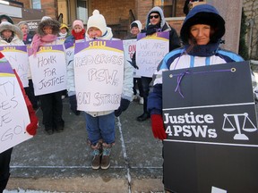 A chilly but determined group of area Personal Support Workers (PSWs) pounded the pavement, on the picket line along Ridout Street in Tillsonburg between Harvey and Broadway Thursday morning for the second day. The local group is part of 4,500 Service Employees International Union Healthcare members provincially who are seeking contractual improvements including a pay raise and improved benefits from Red Cross Care Partners. Jeff Tribe/Tillsonburg News