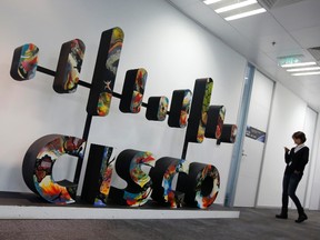 A Cisco logo is seen at its customer briefing centre in Beijing, Nov. 14, 2013. REUTERS/Kim Kyung-Hoon