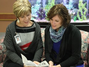 Lisa Rybak (left), community care manager at the WestView and Evansburg Health Centre and Christy Travis on Dec. 5 at the WestView Health Centre in Stony Plain. - Karen Haynes, Reporter/Examiner