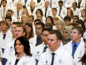 First-year medical students at the University of Western Ontario's School of Medicine participate in the annual White Coat Ceremony.
QMI AGENCY FILE