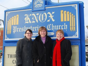 Becky Ahrens of VON Middlesex-Elgin, left, stands with Rev. Mavis Currie of Knox Presbyterian Church in St. Thomas and Lynn Davis of Serenity House Hospice. Knox will host the Time to Remember memorial service on Tuesday, a chance to remember and celebrate lost loved ones over the holidays.