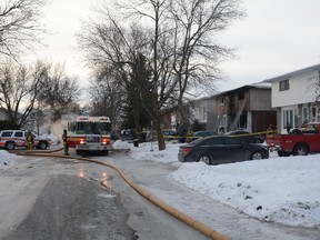 Two young women were killed early Saturday morning, Dec. 14, 2013, after a fire broke out at a Claymor Ave. home in the west end shortly before 3 a.m. Several others were injured. 
Chris Hofley/Ottawa Sun/QMI Agency