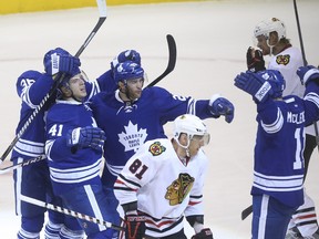 Leafs' Nikolai Kulemin (41) beats Hawks goalie Antti Raanta to put the Leafs up 4-2 in the second period at the ACC. (Jack Boland/Toronto Sun/QMI Agency)