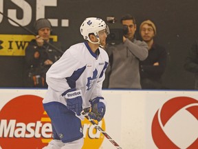 Jerry D'Amigo gets some attention from the HBO 24/7 crew as he  takes part in the Toronto Maple Leafs practice at the Mastercard Centre in Toronto on Dec. 6. (Michael Peake, Toronto Sun)