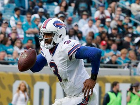 EJ Manuel #3 of the Buffalo Bills scrambles for yardage during the game against the Jacksonville Jaguars at EverBank Field on December 15, 2013 in Jacksonville, Florida.   Sam Greenwood/Getty Images/AFP
