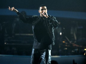 Drake performs at the Scotiabank Saddledome in downtown in Calgary, Alta. on Saturday November 30, 2013. (Stuart Dryden/QMI Agency)