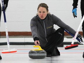 Skip Hollie Nicol of Toronto releases a shot on the way to winning the final of this weekend's 2013 Ontario Scotties East Regional Women's curling championship at the Cataraqui Golf and Country Club. Nicol defeated Cathy Auld's rink 8-5 to earn a trip to the provincial championships.(Elliot Ferguson The Whig-Standard)