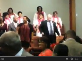 In this screengrab from YouTube, Toronto Mayor Rob Ford is seen busting a move with the choir at the West Toronto Church of God.
