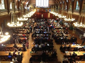 Students gather in the Annenberg Hall after being evacuated from campus buildings, after unconfirmed reports that explosives had been planted at Harvard University in Cambridge, Mass., on December 16, 2013. (REUTERS/The Harvard Crimson via Reuters)