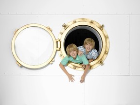 (L-R) Cole Sprouse as "Cody Martin" and Dylan Sprouse as "Zack Martin" star on "The Suite Life On Deck" airing on Disney Channel.