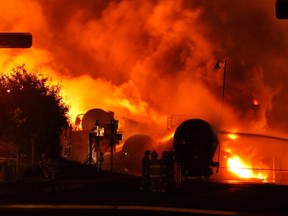 Fire from a train explosion is seen in Lac-Megantic, Quebec on July 6, 2013. (Transportation Safety Board of Canada/Handout/QMI AGENCY)