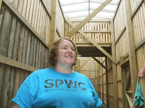 Assistant director Leah Birmingham inside a newly built aviary at the Sandy Pines Wildlife Centre in Napanee.
Michael Lea The Whig-Standard