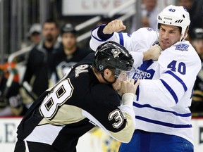 Maple Leafs' Troy Bodie and Penguins' Zach Sill mix it up in Pittsburgh's 3-1 win on Monday night. (Getty Images/AFP)