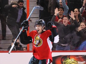 Ottawa Senators' Cody Ceci celebrates his game winning overtime goal to defeat the St. Louis Blues 3-2 in NHL hockey action at the Canadian Tire Centre in Ottawa, Ontario on Monday December 16,2013. Errol McGihon/Ottawa Sun/QMI Agency