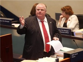 Mayor Rob Ford apologizes to Toronto Star reporter Daniel Dale in council on Tuesday. (MICHAEL PEAKE/Toronto Sun)