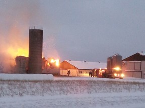 Lucknow Fire Department were called to a fire at the property of Fred DeBoer early in the morning of Dec. 12, 2013. The fire consumed a bank barn and farm equipment. (PAT MCKILLOP/SUBMITTED)