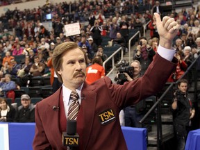 Ron Burgundy (Will Ferrell) waves to the crowd at the Canadian Olympic Curling Trials in Winnipeg, Man. Sunday December 01, 2013.
Brian Donogh/Winnipeg Sun/QMI Agency