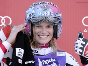 Austria's Marlies Schild celebrates her victory in the World Cup slalom December 17, 2013, in Courchevel, France. Schild won to equal the record for the most victories in the discipline. (AFP PHOTO/FRANCK FIFE)