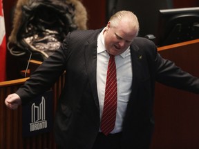 Mayor Rob Ford and council members dance to a band during the afternoon session of Toronto city council on Tuesday, December 17, 2013. (Michael Peake/Toronto Sun)