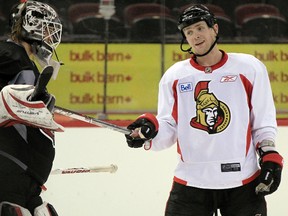 Senators goali, Robin Lehner has a little fun with Zack Smith during team practice at the Canadian Tire Centre on Monday.