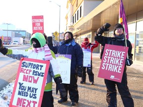 Members of the SEIU Healthcare union picket outside the Community Care Access Centre office at the Rainbow Centre. They are just a few of the 4,500 personal support workers across Ontario currently on strike.  Gino Donato/The Sudbury Star