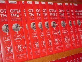 Copies of Ottawa On The Move magazine fill a shelf at City Hall's information desk.  The city spent close to $6,100 to publish the glossy guide.
JON WILLING/OTTAWA SUN/QMI AGENCY