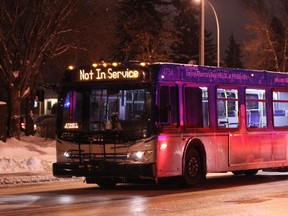 An Edmonton Transit System bus is marked out of service  as slippery roads caused the transit authority to suspend due to the effects of freezing rain on the roadway system in Edmonton, Alta., on Saturday, Dec. 14, 2013. Vehicle crashes were reported across the city. Ian Kucerak/Edmonton Sun/QMI Agency