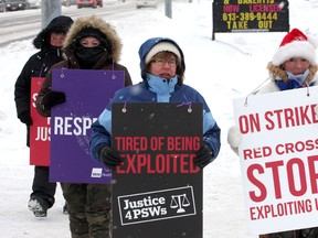 Striking personal support workers picket in the cold weather in front of Red Cross offices on Princess Street on Tuesday morning.
Ian MacAlpine The Whig-Standard