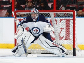 Goaltender Al Montoya #35 of the Winnipeg Jets warms up prior to the game against the Florida Panthers at the BB&T Center on December 5, 2013 in Sunrise, Florida.