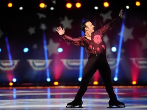 Brian Boitano skates during the P&G & Wal-Mart "Tribute to American Legends of the Ice" at the Izod Center December 11, 2013 in East Rutherford, N.J. (Maddie Meyer/Getty Images/AFP)