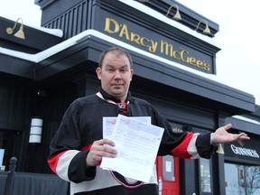 Derek Adam is flabbergasted after being charged more than $40 in delivery fees to have just $3 of electricity sent to his business in Kemptville. He's worried other unwitting customers are also getting massively over-billed for hydro. MICHAEL AUBRY/OTTAWA SUN/QMI AGENCY