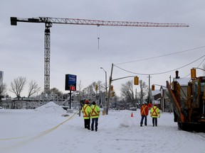 Kingston road crews prepare the area around the massive fire scene by removing ice and snow on Princess and Victoria Streets on Thursday December 19 2013 The fire took place Tuesday. IAN MACALPINE/KINGSTON WHIG-STANDARD/QMI AGENCY