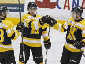 Kingston Frontenacs Samuel Schutt, middle, celebrates a goal with teammates Sam Bennett, left, and Ryan Kujawinski against the Petes during first-period OHL action on Thursday at the Memorial Centre in Peterborough. (Clifford Skarstedt/QMI AGENCY)