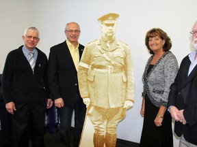 A group of Brian Angyal, chair of the Sir Arthur Currie Memorial Project, Lambton-Kent-Middlesex MP Bev Shipley, Strathroy-Caradoc Mayor Joanne Vanderheyden and Currie Project secretary John Saergent are all smiles during a funding announcement at the West Middlesex Memorial Centre Dec. 18. The government's Veterans Affairs' Community War Memorial Project provided $50,000 towards the initiative, which will erect a statue of its namesake in August.
JACOB ROBINSON/AGE DISPATCH/QMI AGENCY