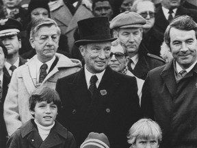 The year 2013 was a good one for Liberal party leader Justin Trudeau, left. But the honeymoon is about to end, and as the party prepares to roll out its campaign platform for the next federal election, voters will have to decide whether Justin compares well with his formidable and charismatic father Pierre. (QMI AGENCY FILE PHOTOS)