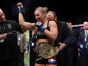 The referee declares Ronda Rousey as winner of her fight against Miesha Tate during their mixed martial art fight in Columbus, Ohio March 3, 2012. (REUTERS/Showtime/Handout)