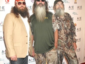 "Duck Dynasty" stars Willie Robertson, left, Phil Robertson, centre, and Si Robertson. (Mr. Blue/WENN.COM)