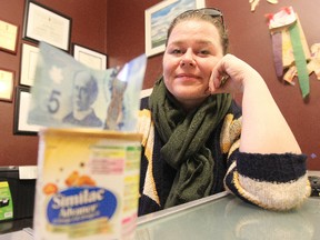 Susan Krepart, a mother of two, raised a mountain of formula and wads of cash for Winnipeg Harvest in as little as a fin and a tin at a time. (Kevin King/Winnipeg Sun/QMI Agency)