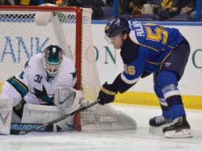 St. Louis Blues left wing Magnus Paajarvi attempts a shot that is blocked by San Jose Sharks goalie Antti Niemi during the second period at Scottrade Center on Dec 17, 2013 in St. Louis, MO, US.(Jasen Vinlove/USA TODAY Sports)