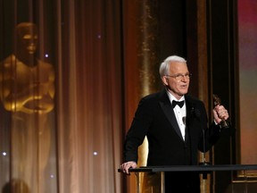 Actor Steve Martin accepts an Honorary Award at the 5th Annual Academy of Motion Picture Arts and Sciences Governors Awards at The Ray Dolby Ballroom in Hollywood, California November 16, 2013. (REUTERS/Mario Anzuoni)