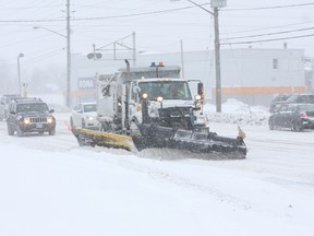 Plows were out in full force on Sunday, Dec. 22, 2013 plowing the roads in Sudbury, Ontario on a bad winter day. JOHN LAPPA/THE SUDBURY STAR (file photo)